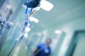 Intravenous drip with blue liquid ready to use Royalty Free Stock Photo