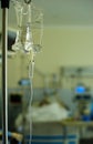 Intravenous infusion drip in emergency threatment room in hospital Royalty Free Stock Photo