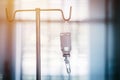 Intravenous Medication therapy or IV medicine bottle fluid drop saline drip in hospital ward, Emergency treatment injection drug