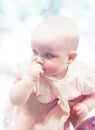 Intrested child in hands Royalty Free Stock Photo