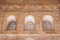 Intricate Arabesque Windows of Nasrid Palace, Alhambra Royalty Free Stock Photo