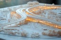 Intricate architectural model of a highway overpass with illuminated details Royalty Free Stock Photo
