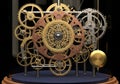 Intricate arrangement of interlocking gears and cogs within a mechanical clockwork system, featuring Royalty Free Stock Photo