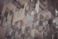 An intricate arrangement of transparent shapes creates a dynamic interplay of light and shadow