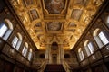 intricate baroque ceiling with gold accents