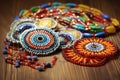 intricate beadwork jewelry laid out on a wooden table