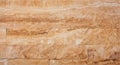 Intricate beige travertine stone background texture ideal for modern design projects Royalty Free Stock Photo