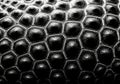 Intricate black hexagonal pattern close up texture detail Royalty Free Stock Photo