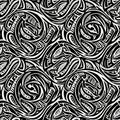 Intricate black and white pattern featuring swirling, interlocking designs. The detailed Royalty Free Stock Photo