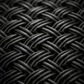 Intricate black woven pattern with a basket-like texture. The design features tightly Royalty Free Stock Photo