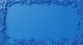 An intricate blue abstract border featuring a variety of swirling, layered patterns and