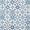 Intricate blue and white ceramic tiles feature geometric star and floral Royalty Free Stock Photo