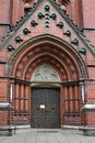 Intricate brickwork around the doorway of a church in Hamburg, Germany