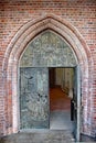 Intricate brickwork around the doorway of a church in Hamburg, Germany