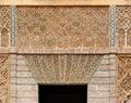 Carved relief above the door in the Royal Alcazar palace in Seville, Spain