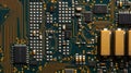 An intricate closeup of circuit boards and microchips b with connections symbolizing the technological backbone of
