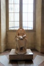 Intricate design of headless statue, inside one of many rooms, The Louvre, Paris, France, 2016