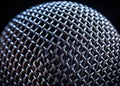 Intricate Detail of a Miniature Black Microphone Grill A TiltShift CloseUp Exploring Texture and Precision Royalty Free Stock Photo
