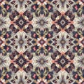 Intricate floral pattern featuring symmetrical, kaleidoscopic arrangements of