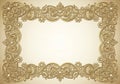 An intricate floral and scroll design in gold on a soft beige Royalty Free Stock Photo