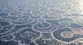 Intricate frost patterns are visible on a flat surface, possibly glass. The ice crystals form Royalty Free Stock Photo