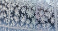 Intricate frost patterns on a window create a mesmerizing display Royalty Free Stock Photo