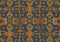 Intricate geometric pattern featuring interlocking shapes in blue, orange, and beige tones. The Royalty Free Stock Photo