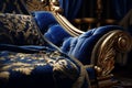 Intricate gold embroidery on a royal blue velvet t Royalty Free Stock Photo