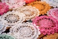 intricate hand-made lace doilies showcased