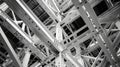 The intricate and interconnected network of beams and columns that make up the inner core of a skyser under construction