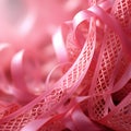 Intricate interweaving of pink ribbons