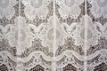 intricate lace detail on a white synagogue curtain