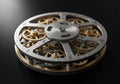 Intricate mechanical assembly featuring interlocking gears, primarily brass and steel. The central Royalty Free Stock Photo