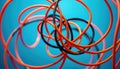 Intricate network of vibrant orange and black cables in a complex intertwined pattern against a bold blue background. Generative Royalty Free Stock Photo