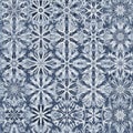 Intricate pattern featuring snowflake designs in a kaleidoscopic arrangement. Each Royalty Free Stock Photo