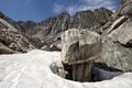 Intricate rock among snow, Sayan mountains. Siberia