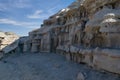 Intricate sandstone carvings line a Bisti Badlands wall