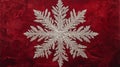 Intricate Silver Snowflake on a Deep Red Velvet Background Royalty Free Stock Photo