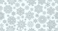 Intricate snowflake patterns fill the image, showcasing diverse geometric designs. Royalty Free Stock Photo