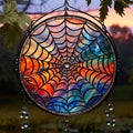 Intricate Stained Glass Art Piece with Spiderwebs and Morning Dew Royalty Free Stock Photo