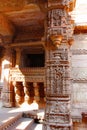 Intricate stone carving on a pillar, pilaster and entablature. Adalaj Stepwell, Ahmedabad, Gujarat