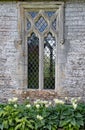 An intricate window in an old English country house