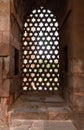 Intricate window panes of the Qutb Minar complex. Delhi, India.