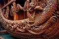 intricate wood carving details on the boats hull