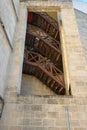 Intricate wooden staircase in historic stone building Royalty Free Stock Photo