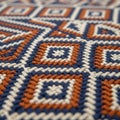 Intricate woven pattern featuring geometric designs in blue, brown, and white Royalty Free Stock Photo