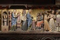 Intricately carved and painted frieze inside Notre Dame Cathedral in Paris depicting Life of Jesus