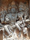 Intricately carved stone statues of Hindu gods adorning the Hoysaleshwara Temple in Halebedu, India Royalty Free Stock Photo