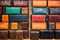 intricately designed leather wallets arranged on a shelf