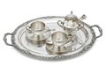 Intricately designed silver tea set featuring two teacups with Royalty Free Stock Photo